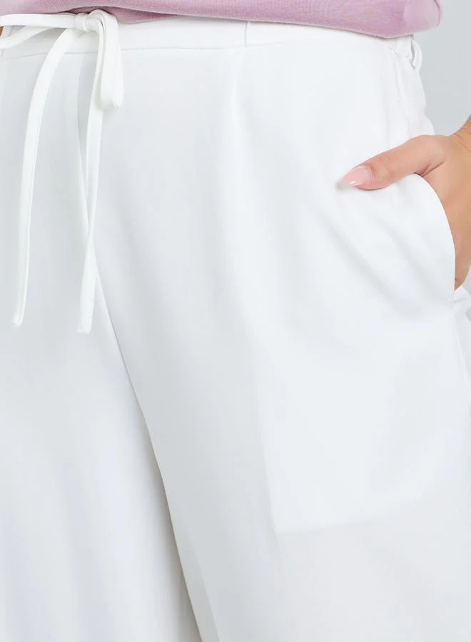 تايك تو بنطال أبيض واسع الساق برباط